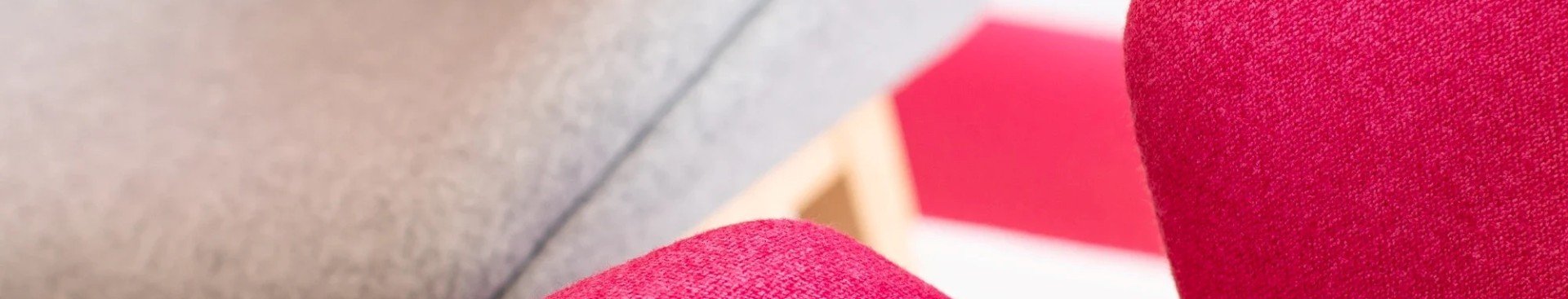 Close up of pink and grey seats inside a Marsden Branch