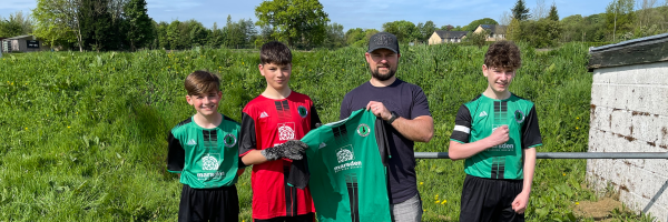 Pendle Forest Raptors players present Andrew Sunter (Marsden Building Society) with club shirt 