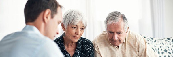 Older couple meet with an advisor to review their mortgage options