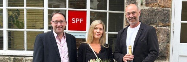 Pierre (SPF) and clients Mr Aand Mrs Griffiths celebrate the Marsden's £50m milestone