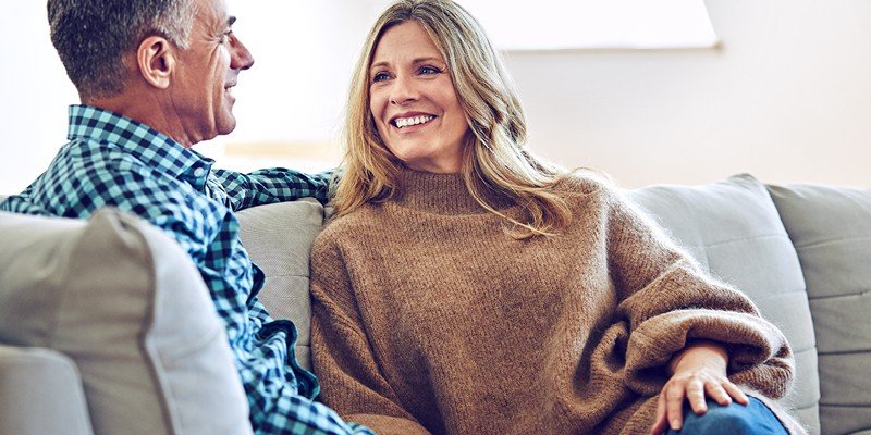 Expat couple discuss their mortgage options with Marsden Building Society