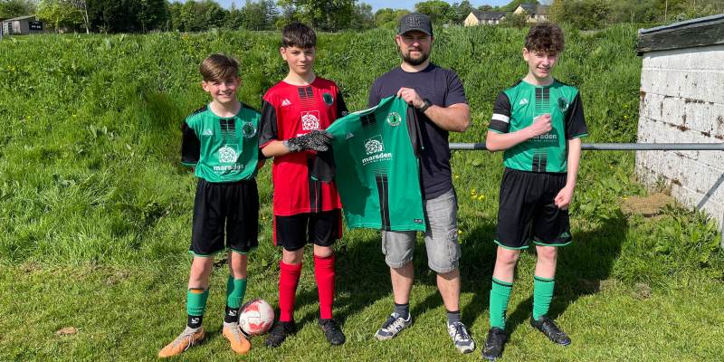 Pendle Forest Raptors players present Andrew Sunter (Marsden Building Society) with club shirt 
