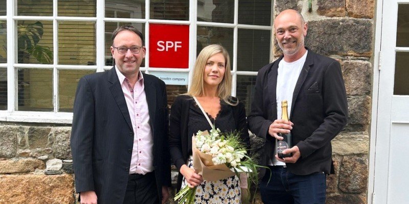 Pierre (SPF) and clients Mr and Mrs Griffiths celebrate the Marsden's £50m milestone